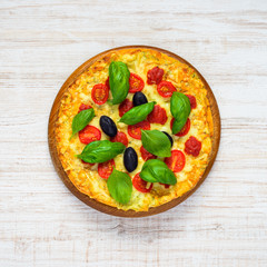 Top View of Pizza with Tomato and Basil