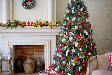 Stylish Christmas interior decorated in white and red colors