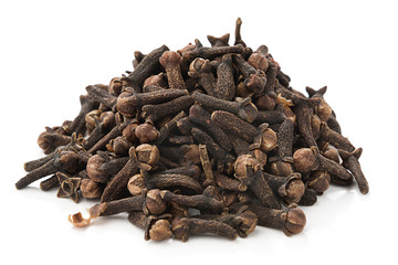 Heap of dried cloves, syzygium aromaticum, isolated on white background.    