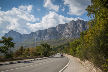 Road with mountains at the background.