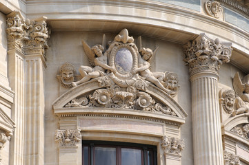 Fototapeta na wymiar Detail of the facade of the Paris National Opera, built in 1875. The modern name - The National Academy of Music and Dance.