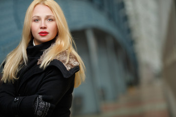 Ginger girl in black coat