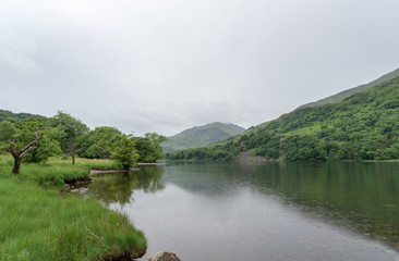 Looking down Llyn Gwynant with the Snowdon massif on the right. Llyn Gwynant is located in the Snowdonia National Park North Wales.
Photo taken on: June 14th, 2016 
