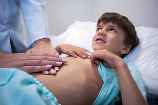 Female Doctor Examining Patient