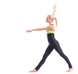 Obraz premium Attractive female gymnast exercising at studio 