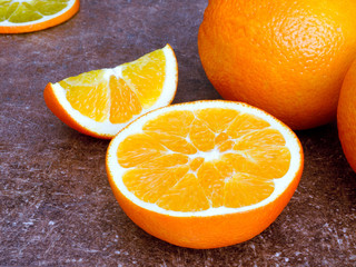juicy fruit orange  on a dark background
