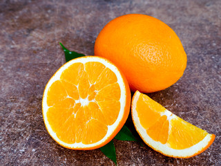 Fototapeta na wymiar juicy fruit orange on a dark background