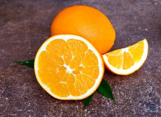 juicy fruit orange  on a dark background