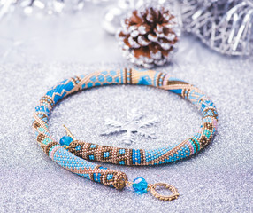 Beadwork. Beaded necklace. Winter. Jewelry. Top view.