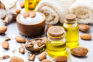 Obraz na płótnie Canvas Natural sweet almond essential oil for beauty and spa