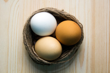 fresh eggs on a wooden background. Easter concept.