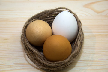 fresh eggs on a wooden background. Easter concept.