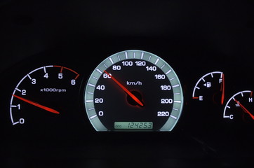 Car dashboard at night. 