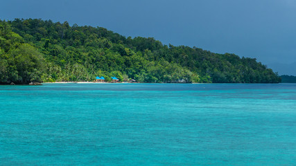 Fototapeta na wymiar Beautiful Blue Lagoone shortly before Thunderstorm, Gam Island, West Papuan, Raja Ampat, Indonesia