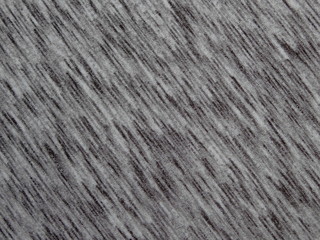 текстура серой ткани с абстрактным рисункам крупным планом     