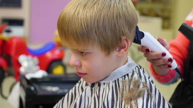 child's haircut at the Barber shop
