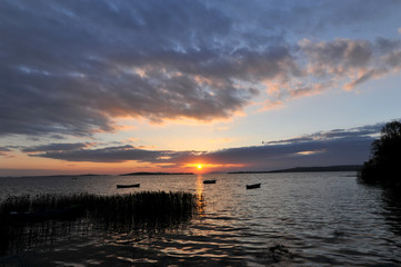 Naklejka na ściany i meble beautiful lake with sunset