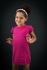 Beautiful girl doing different expressions in different sets of clothes: innocent