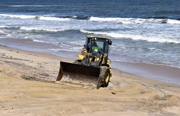 For lift clearing beach of debris caused by hurricane Matthew hitting along the east coast of Florida, USA