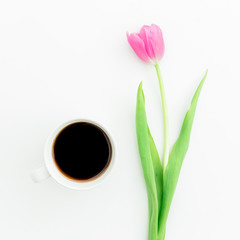 Fototapeta na wymiar Tulip flowers and coffee. Flat lay, Top view