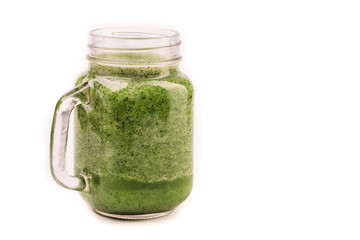 Fresh green smoothie isolated on white background. Superfood, detox and healthy food.