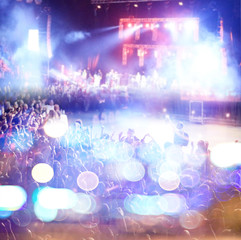 Fototapeta na wymiar blurred background light lights people rock concert nights
