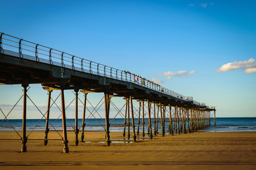 Naklejka premium Pier on blue sky background at Saltburn by the Sea