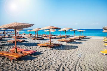 Sea panorama, overlooking the blue sea and beach with a yellow s