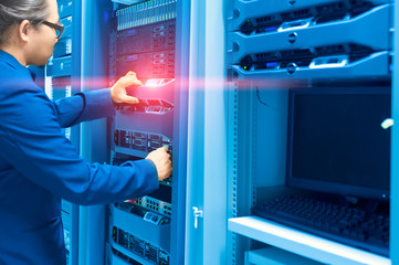 Man fix server network in data center room