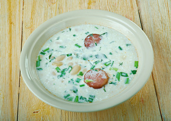 Soup with beans, sour cream and sausage