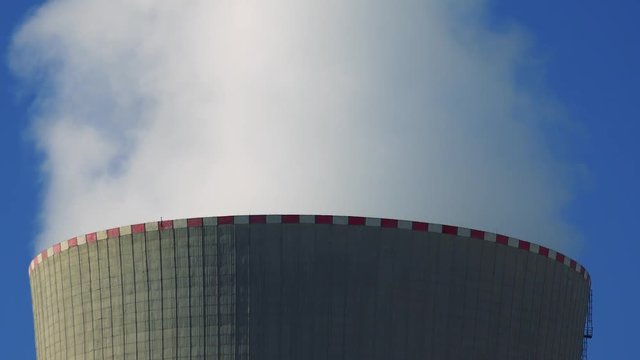 nuclear power station (four chimneys) - smoke from smokestacks - detail