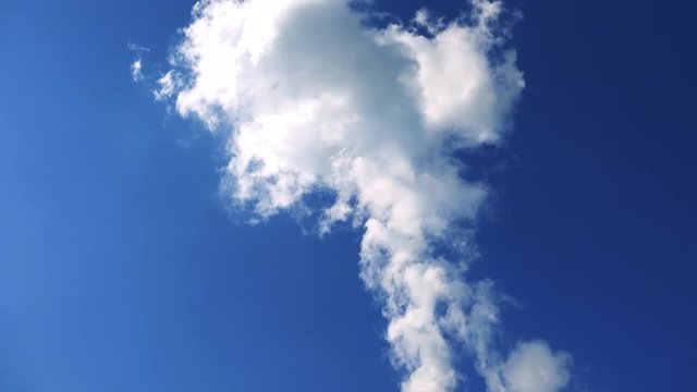 nuclear power station - smoke from chimney - closeup - blue sky