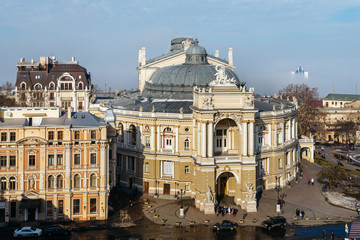 Fototapeta premium Top view of the Odessa Opera and Ballet Theater in the heart of Odessa, Ukraine. In the city and the sea mist