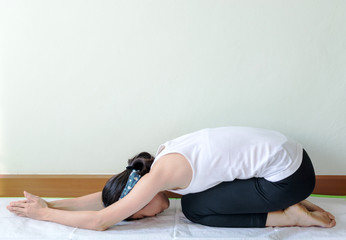 young woman doing yoga