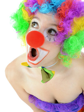 Clown geschminkt in Kostüm zu Karneval, Fasching oder Fastnacht