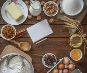 top view of wooden rustic kitchen board with organic ingr