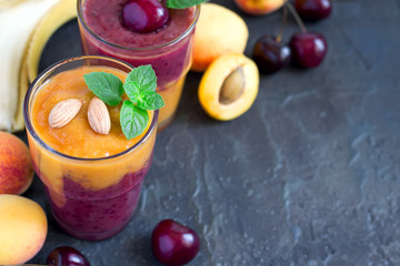 Colorful smoothies from apricots and cherries, selective focus