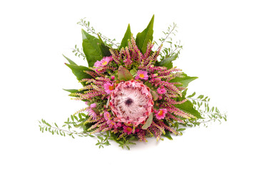 Wedding bouquet in hands of the bride on a white background