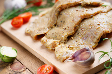 Raw marinated pork meat and vegetables 