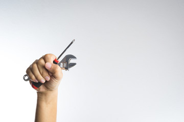 Hand holding screwdriver
