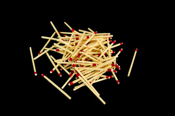 Pile of matches, from side, isolated