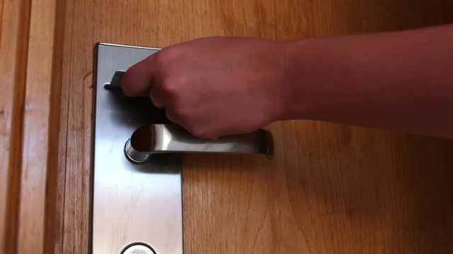 woman opens the door with the key card