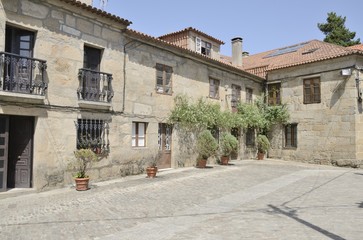 Fototapeta na wymiar Stone houses in a plaza in Cambados, Spain