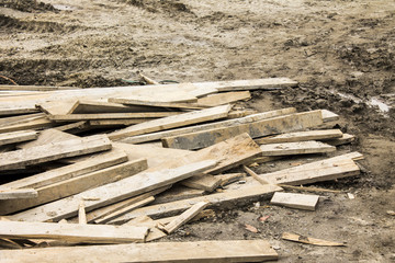 Boards on the soil at the construction site