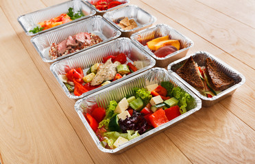 Healthy food in boxes, diet concept.