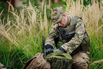 Fototapeta premium Army rangers during the military operation in the forest