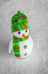 funny snowman standing in the snow