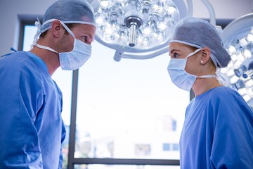 Surgeons interacting with each other in operation theater