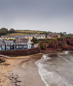 Colourful houses around the sandy bay of Dunmore East, Waterford, Republic of Ireland