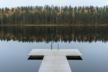 Peaceful Still Lake with bathing platform